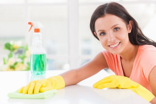Professional Kingston cleaners handling delicate garments with care