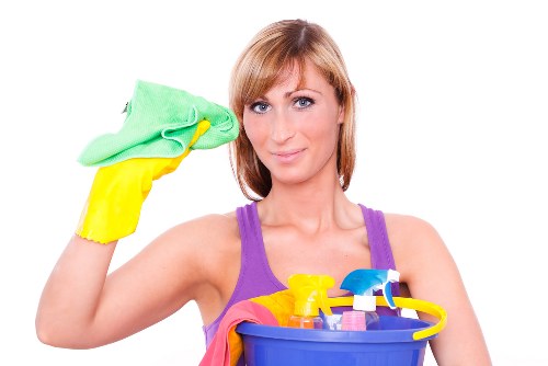 Professional carpet cleaner in Kingston deep cleaning a living room carpet