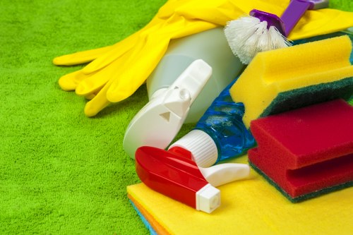 Technician using window cleaning tools for streak-free results in Kingston